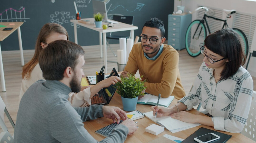young people discussing in group