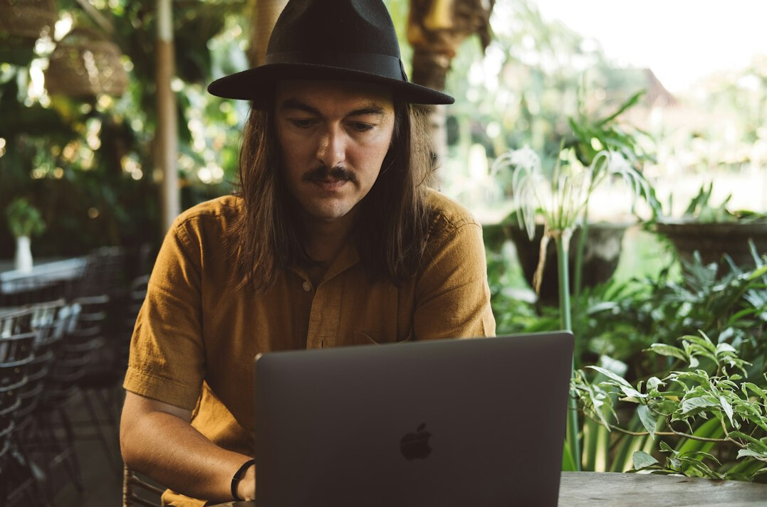 person looking at laptop screen